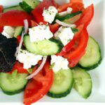 Fresh & Flavorful: Tomato, Cucumber, and Feta Salad Delight